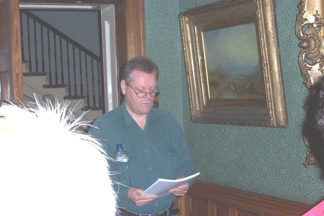 Robert Sheppard reading at Studley House, beside Turner's 'The Wreck Buoy'